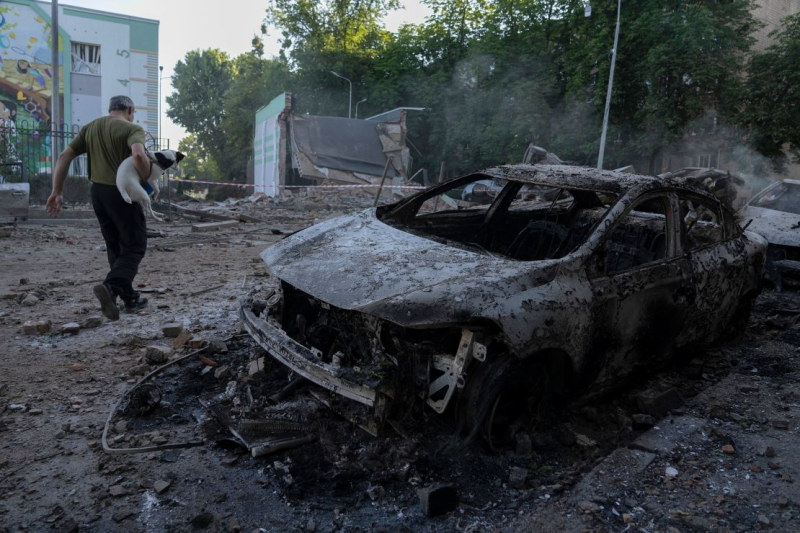 Ukraine says it struck a Russian air base as Moscow sent hundreds of drones into Kyiv